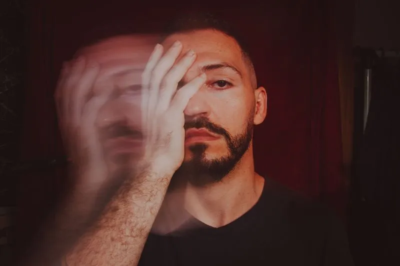 double exposure of mans face moving