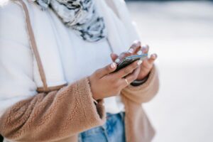 person scrolling on phone