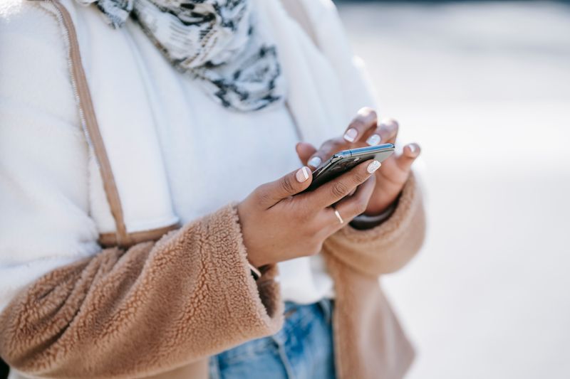 person scrolling on phone