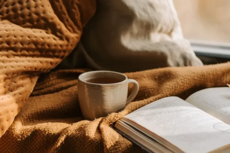 blanket coffee and book