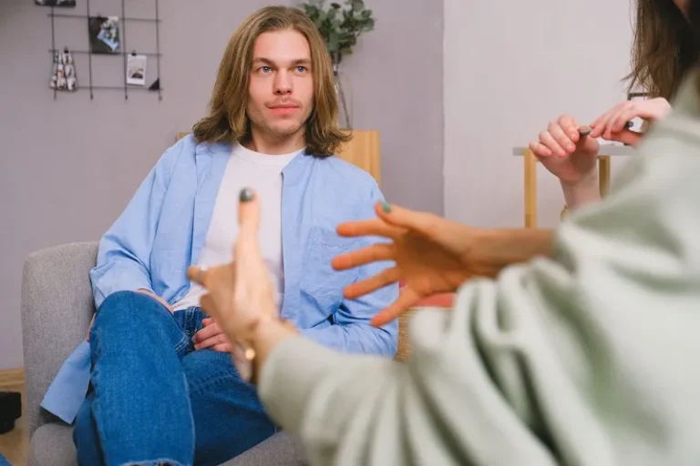 man talking to therapist