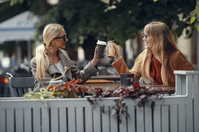 two friends having coffee together