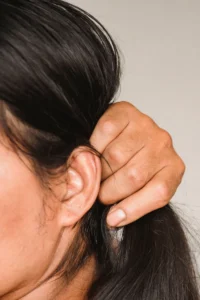 woman holding hair