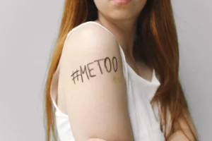 woman with me too written on her arm