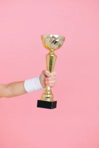 person holding trophy