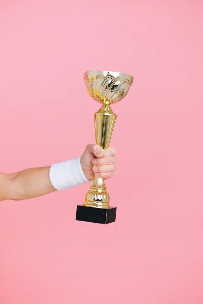 person holding trophy