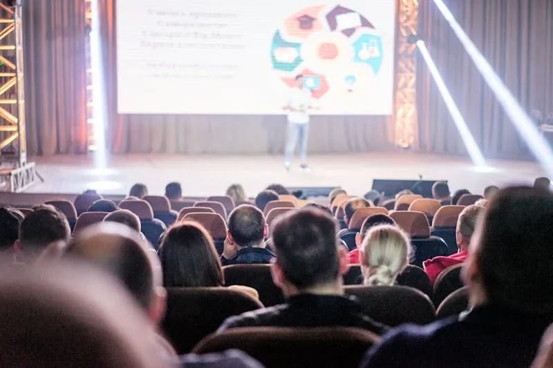 person giving talk to audience